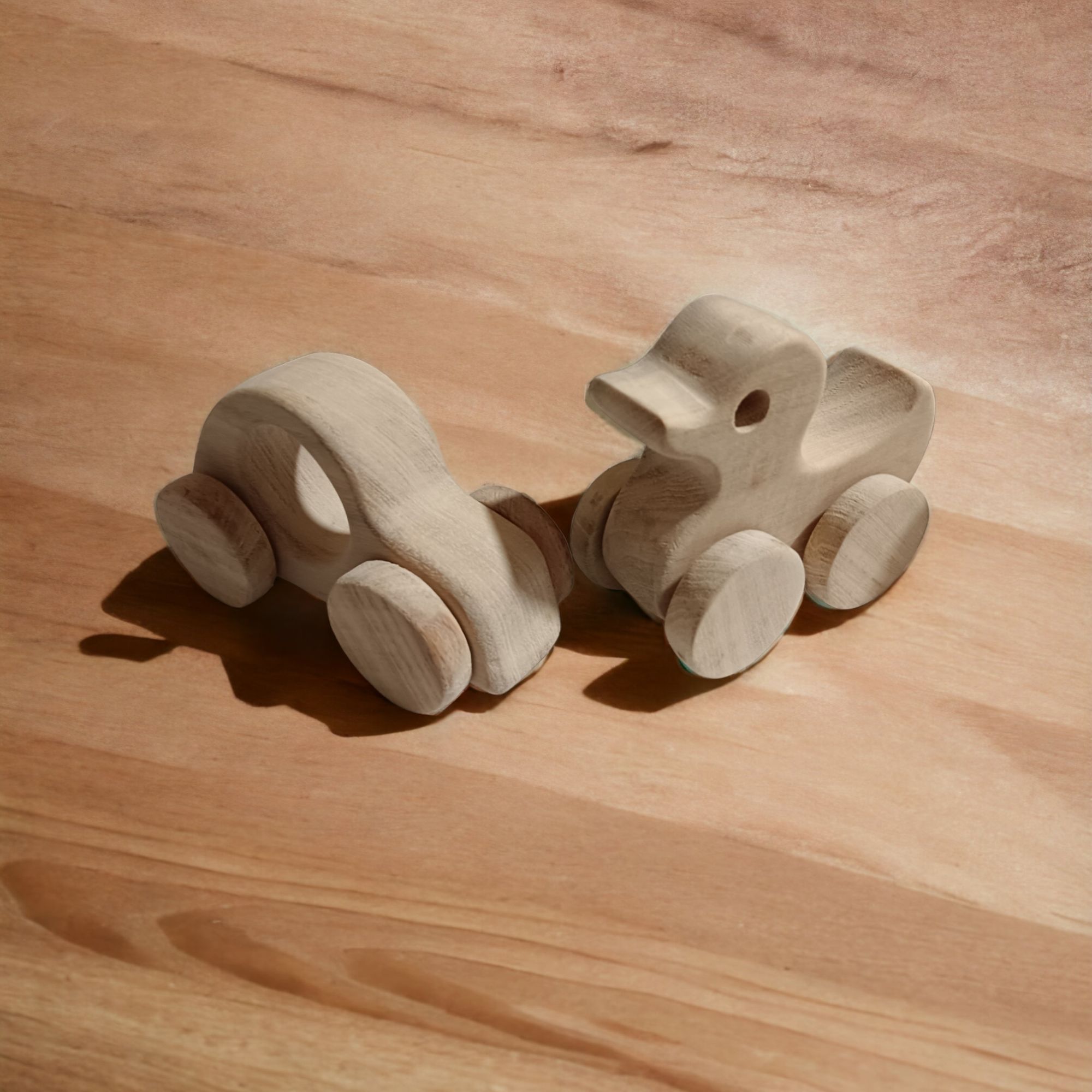 Pack of 2 Neem Wooden Wheel Toys - Car & Duck Shapes